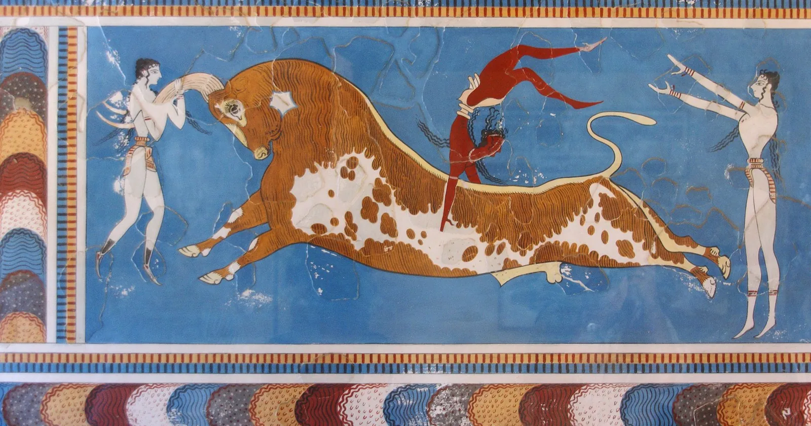 The Minoan bull-leaping fresco from Knossos, showing an acrobat vaulting over the back of a charging bull.